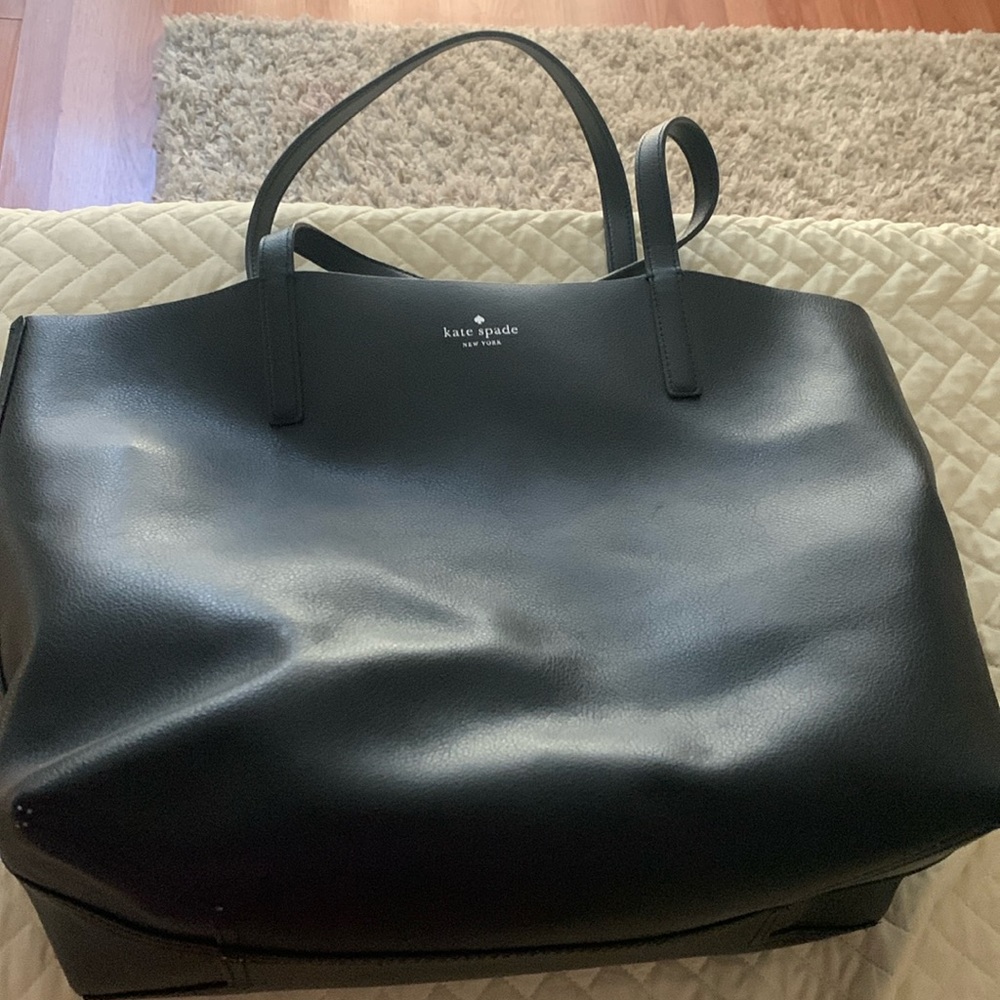 Reversible black and silver Kate spade purse
